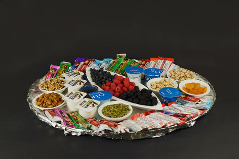 Build-Your-Own Yogurt Parfait Bar with Greek yogurt, granola, fresh berries, honey, and nuts